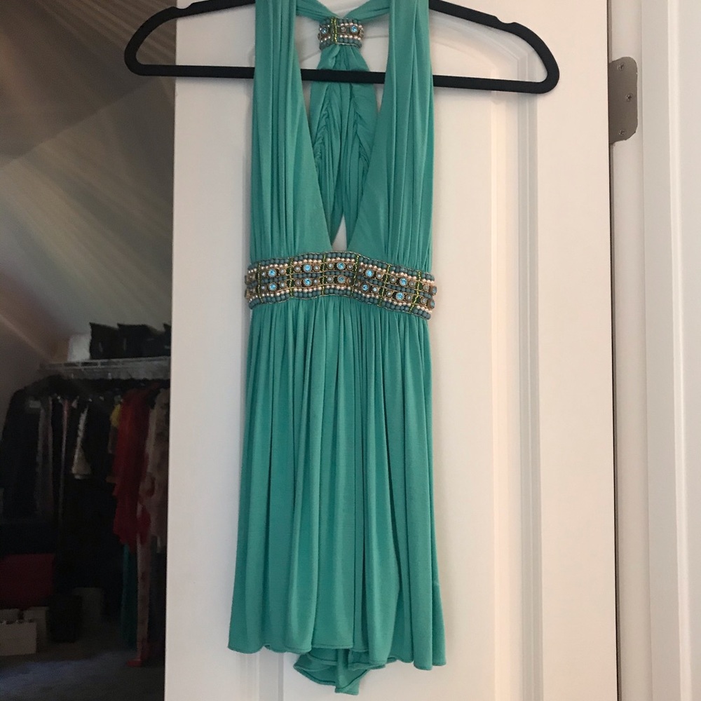 Adorable sky top with embellishment